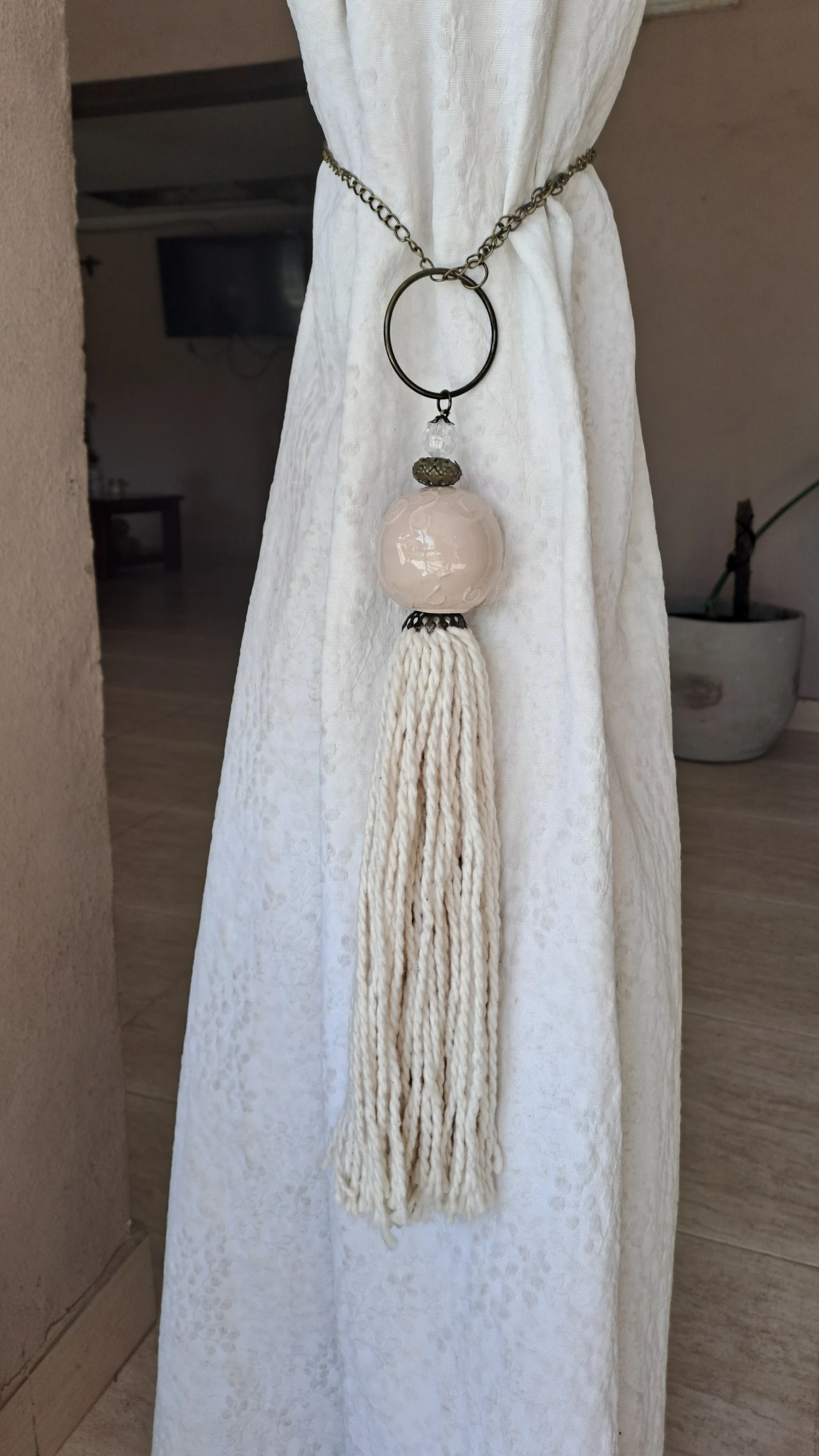 Borla de cerámica con algodón natural